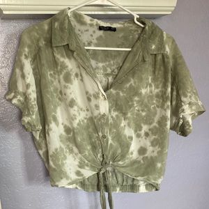 A tie dye green top